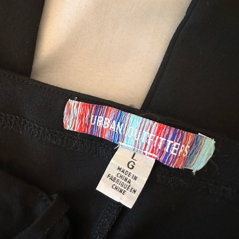 Urban Outfitters, black stretchy pants, bell bottoms, with a waist strap